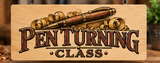 Handcrafted wooden Pen Turning Class sign featuring an engraved wooden pen, curled wood shavings, and vintage-style lettering against a warm workshop background.